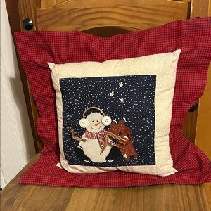 Handmade decorative pillow featuring a snowman appliqué 15”x15” wintery theme